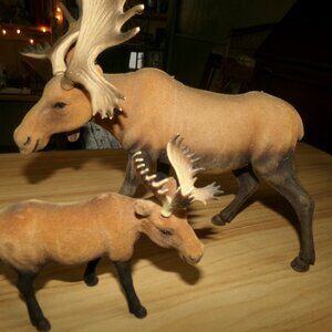 2 vintage flocked moose.